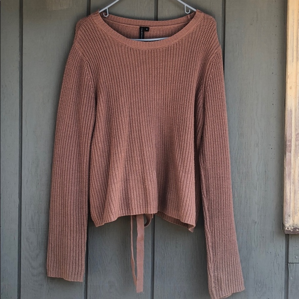 pink sweater with tied back